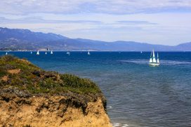 A view of sailboats on the ocean just off the coast of Santa Barbara